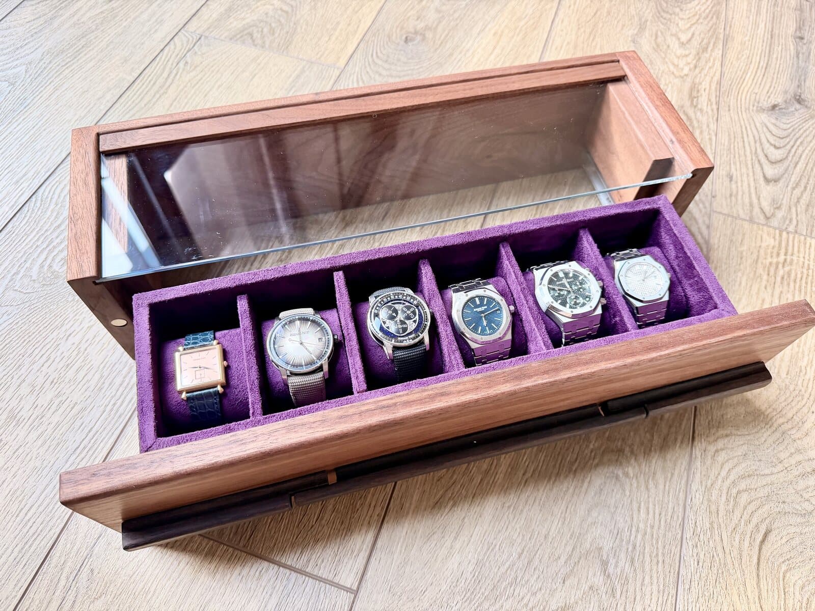 Six watches from the collection in their box