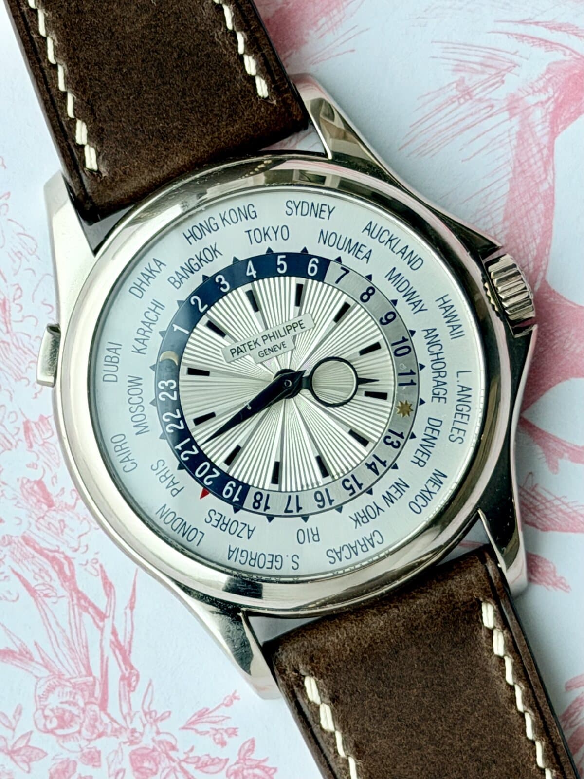 Patek Philippe World Time 5130G with Hong Kong on the city ring, full frame