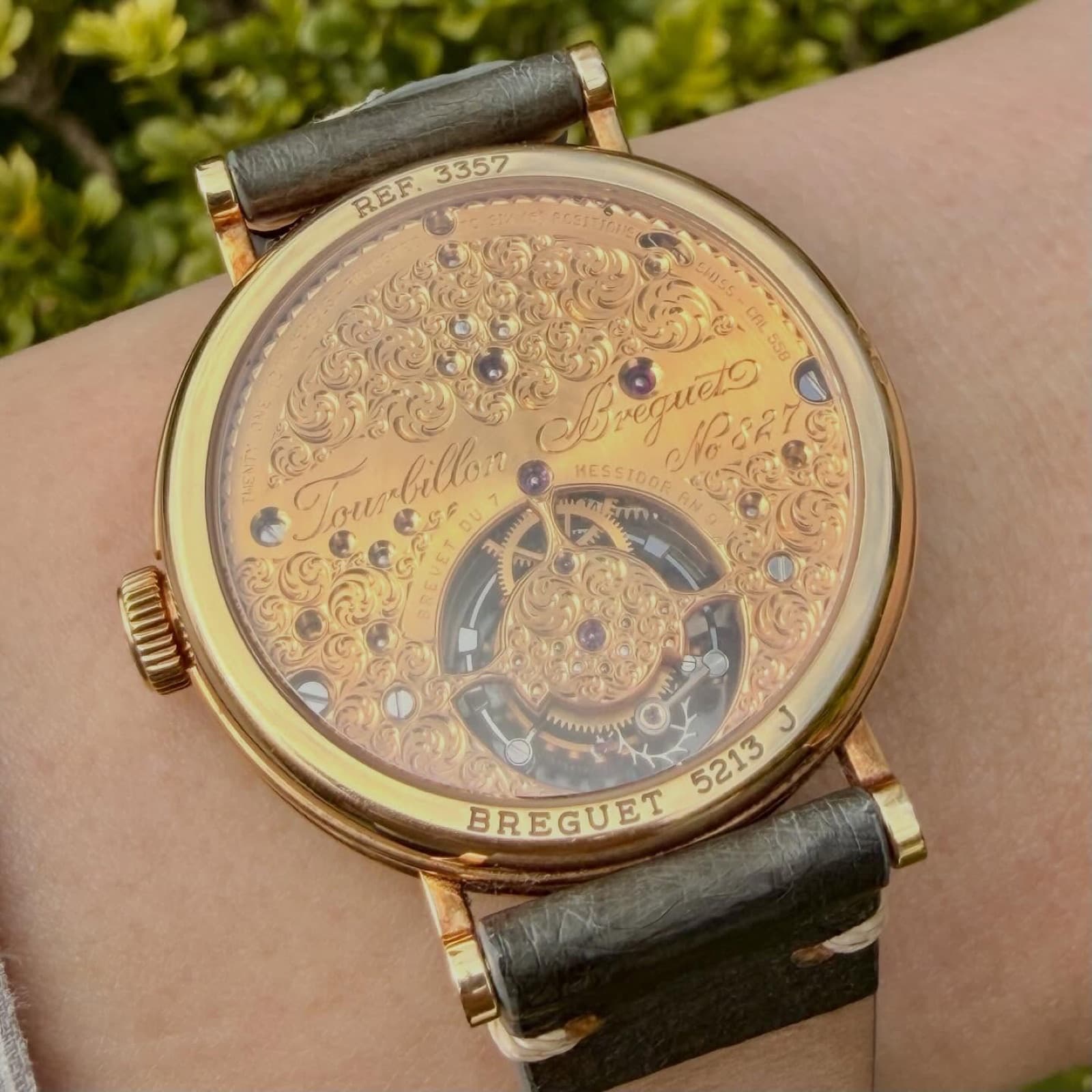 Breguet 3357BA through the sapphire caseback, engraved movement