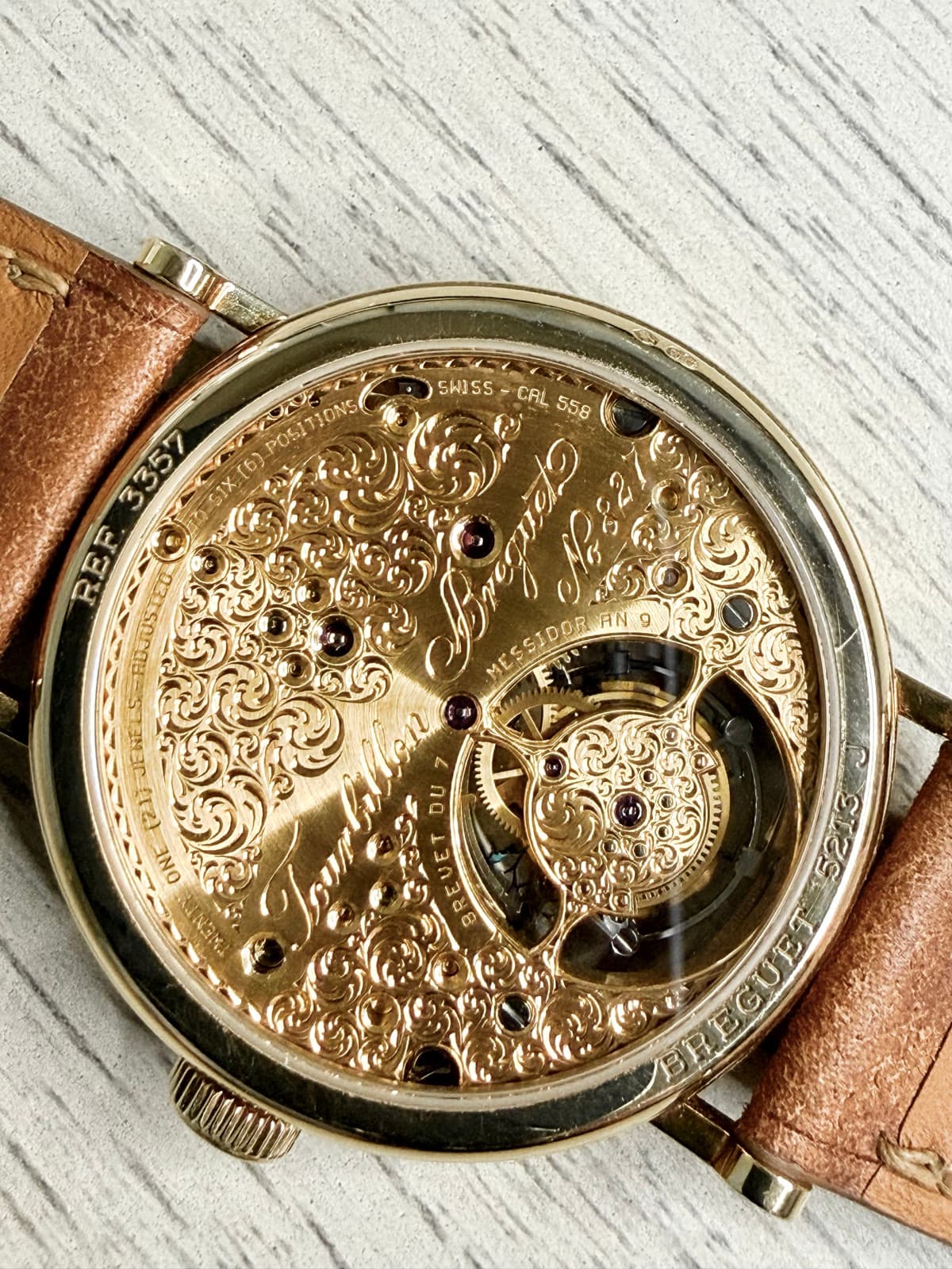 Close-up of the hand-engraved scrollwork on the Breguet 3357BA movement